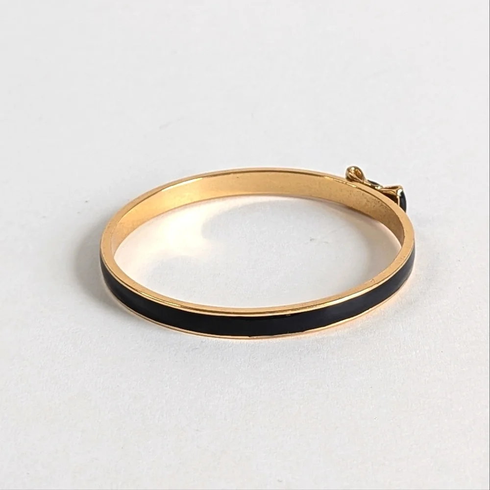 kate spade Black and Gold Enamel Bow Bangle Bracelet